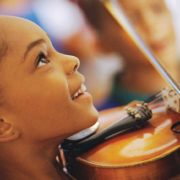 Parents considering making a commitment to music instruction may find that kids benefit from being involved with music in many ways, some of which may be surprising.